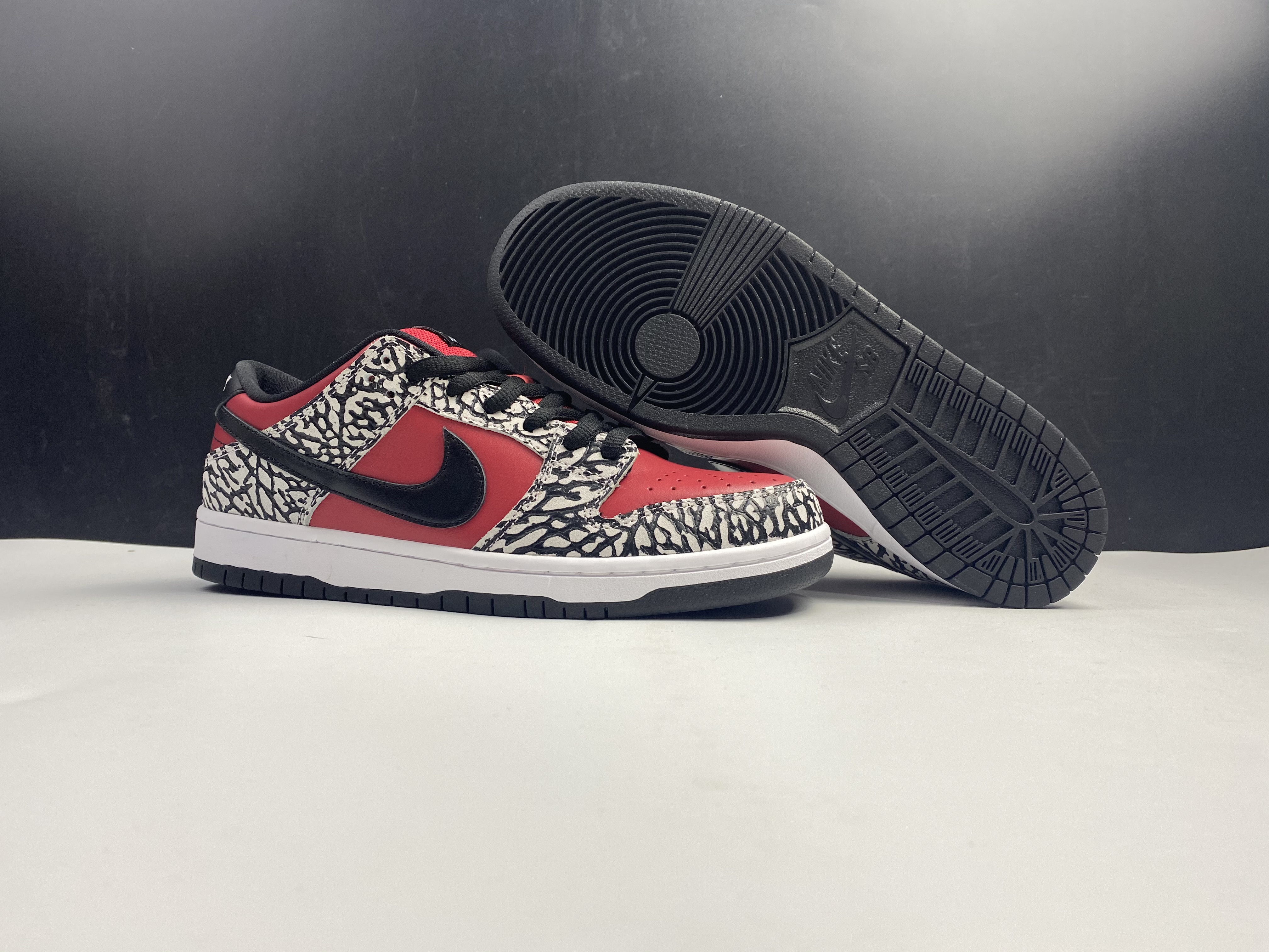 from NIKE Dunk SB x Supreme 313170-600