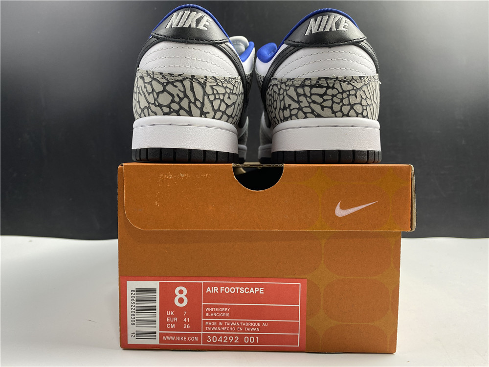 from Supreme × Nike SB Dunk Low “White Cement 304292-001