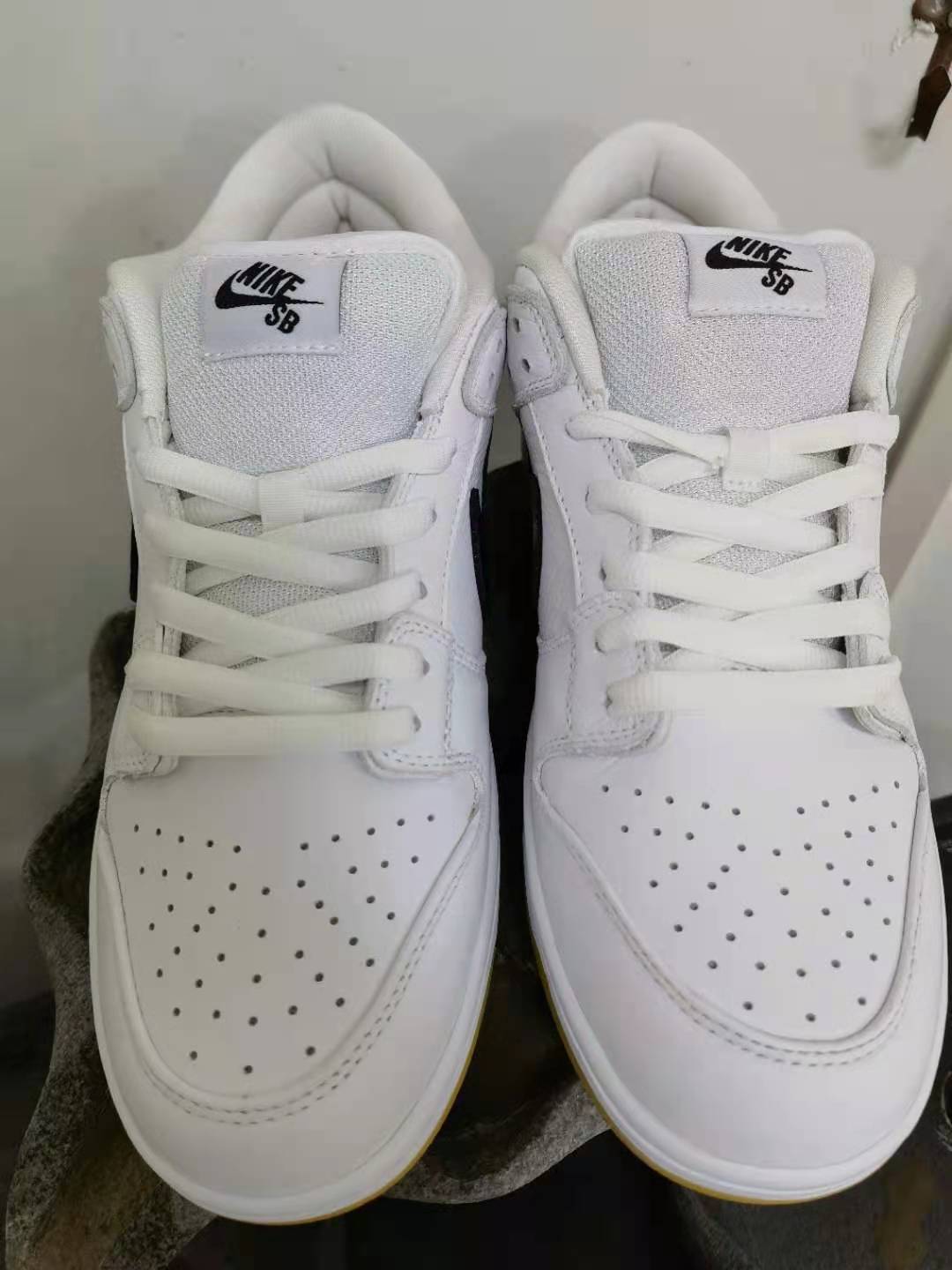 from Nike Dunk SB Low Orange Label White Black CD2563-100