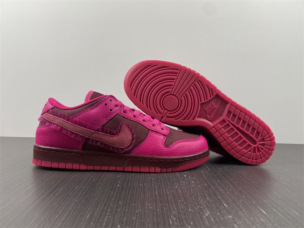from Nike Spruces Up Its Dunk Low Team Red/Pink DQ9324-600