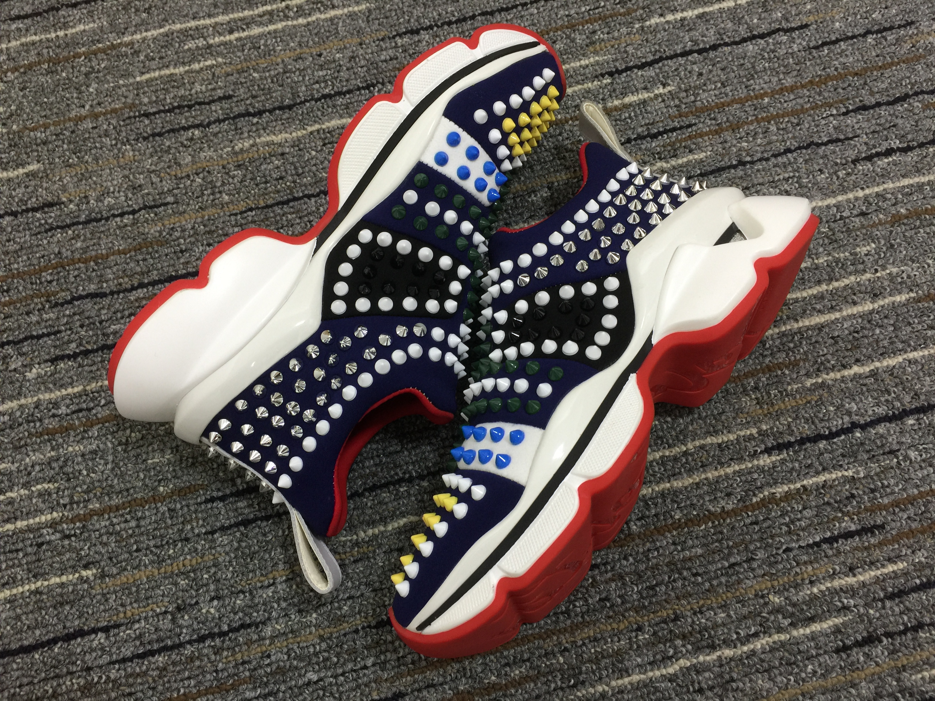 C*ristian L*uboutin Red Runner Sneaker